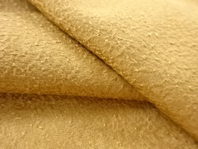  のり散らし模様織り出し一つ紋色無地着物